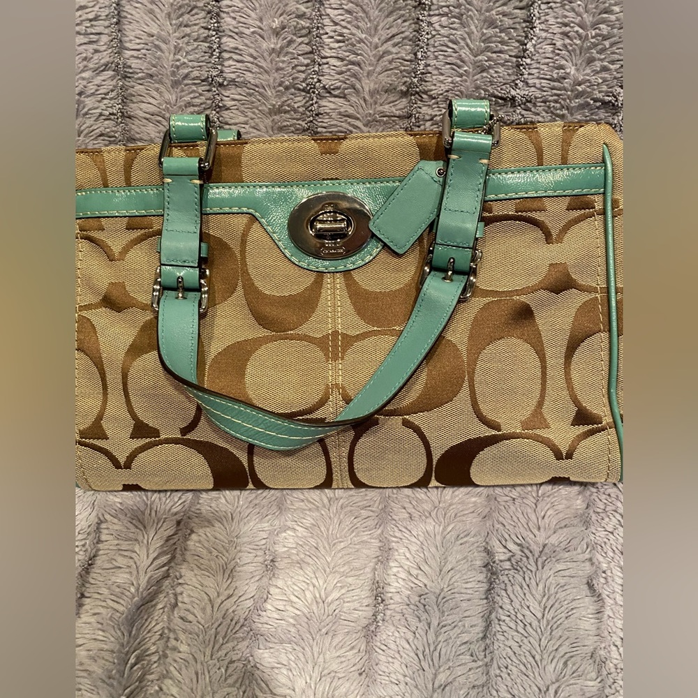 Teal and tan Coach handbag
